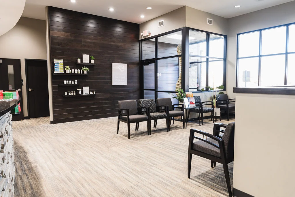 Wayson Family Chiropractic waiting area viewed from the front desk perspective