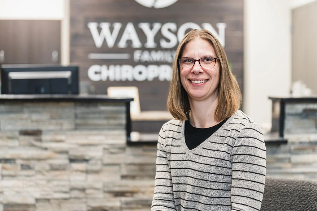 Wayson Family Chiropractic staff smiling looking professional