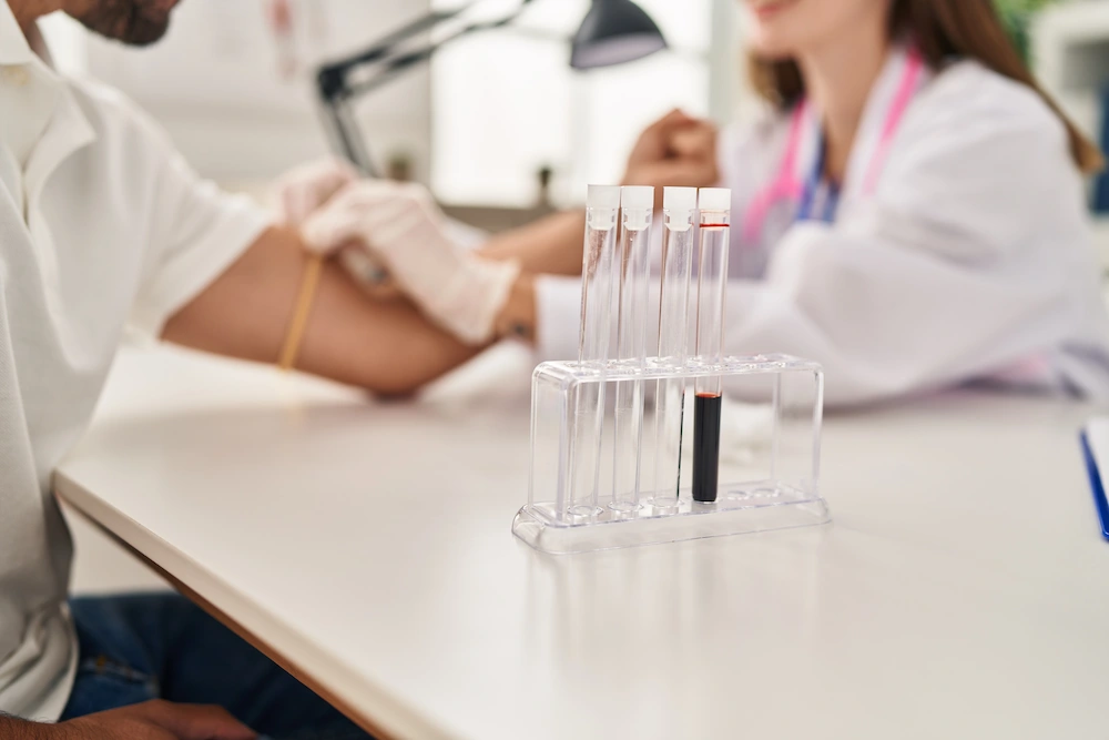 Practitioner reviewing lab test results to assess overall health and support functional wellness plan